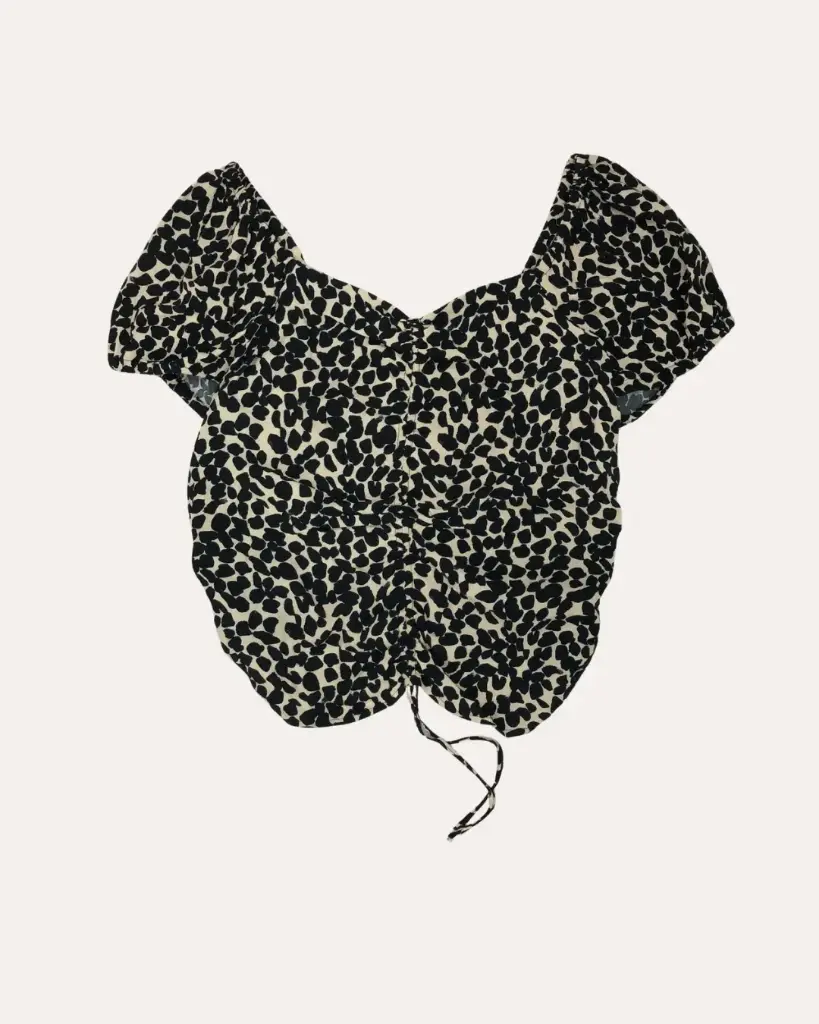 BLUSA ANIMAL PRINT H&M